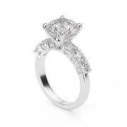 White Gold Round Shape Diamond Side Stone Engagement Ring With Prong Setting 