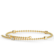  Yellow Gold East West Emerald Cut Diamond Bracelet With Bezel Setting.