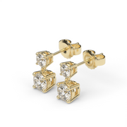 Yellow Gold Round Shape Diamond Two Stone Earrings With Prong Setting.