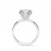 White Gold Round Shape Diamond Side Stone Engagement Ring With Burnish Setting. 