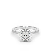 White Gold Side Stone Round Shape Diamond Engagement Ring With French Cut Pave Setting.