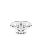 White Gold Solitaire Round Shape Diamond Engagement Ring With Prong Setting.