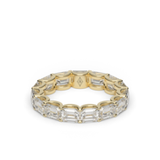 Yellow Gold Emerald Cut Diamond Eternity Ring/Band With Split Prong Setting.